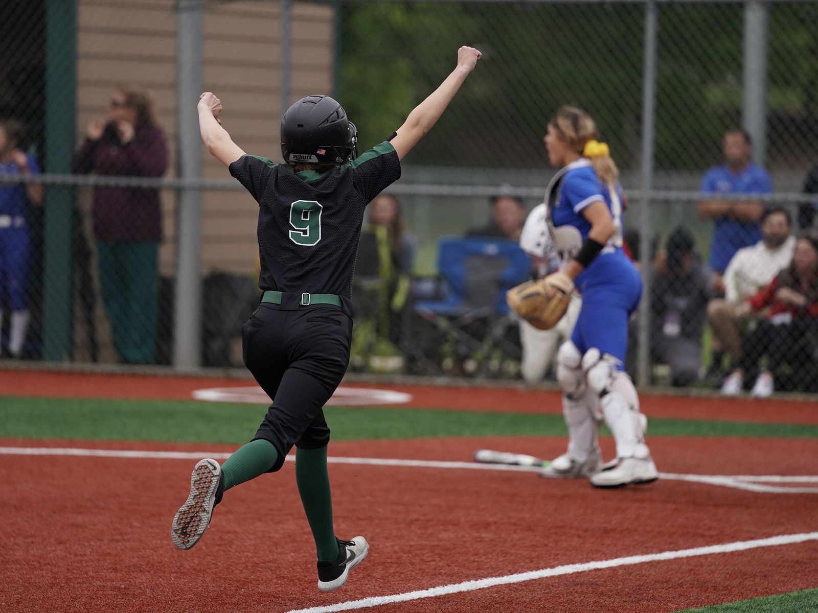 The Tigard and Newberg softball team compete in a Class 6A state quarterfinal game on Friday, May 27, 2022 at Tigard High School.