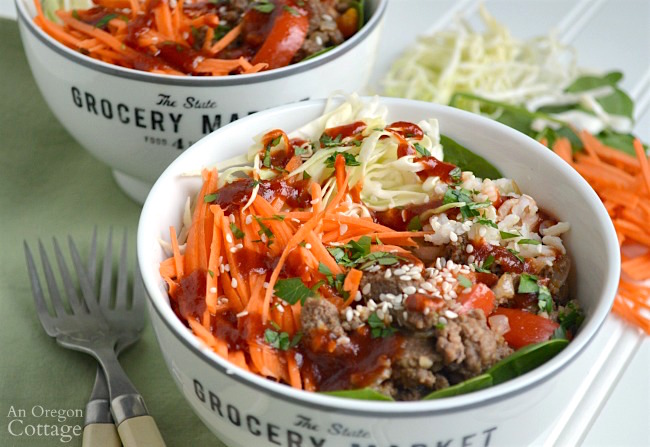 Bowls full of beef, vegetables and rice