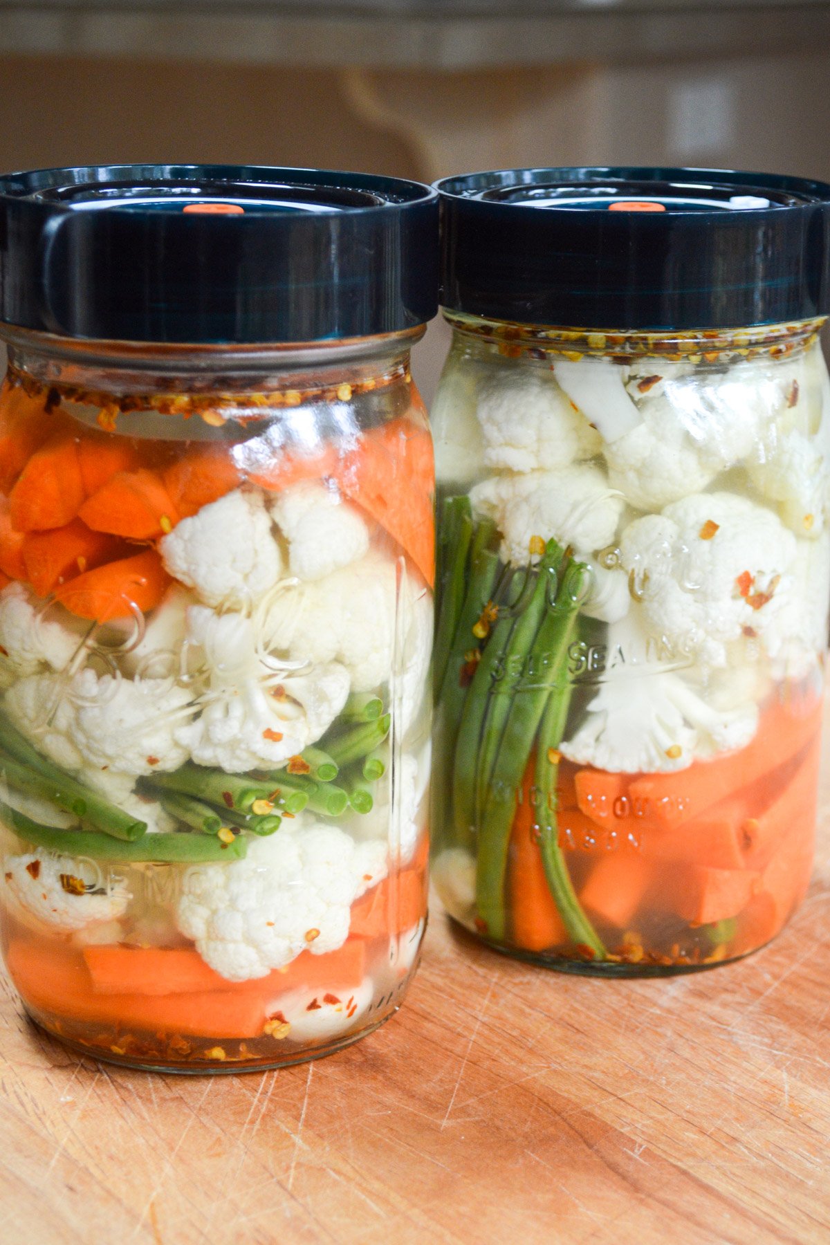 quart jars of fermented vegetables with easy lids